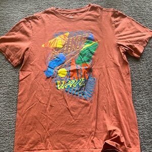 Orange Nike tee